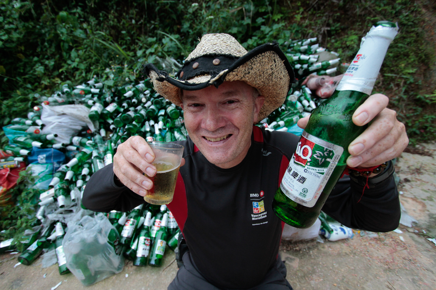 Brian with a LIQ beer after a long Rice Terraces hike (2010)